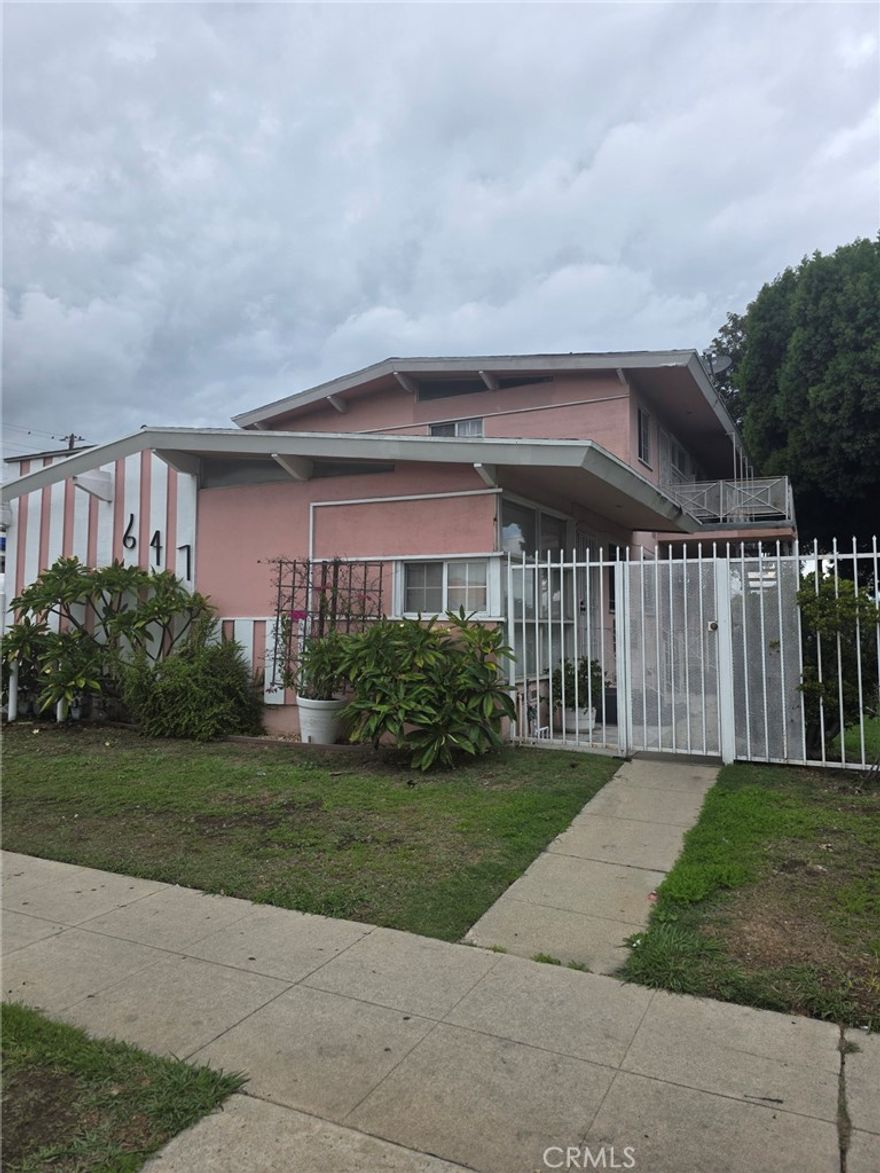 The property has two 2-bedroom, 1-bath units and three 1-bedroom and 1-bathroom units.  Three of the units have been recently updated with new flooring, kitchens, and bathrooms.  There is a laundry room on the property. Each unit has a parking space in the rear. The property is close to the 110 and 105 freeways for an easy