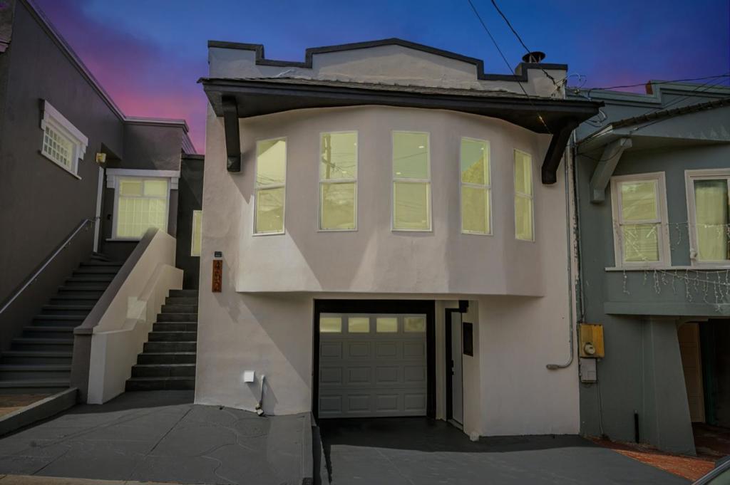Welcome to 452 Irvington Street, a beautifully renovated home offering modern design, functional layout, and exceptional flexibility. The main level features a thoughtfully designed 2-bedroom, 1-bath floor plan accented by a charming bay window that fills the living space with natural light. The gourmet chefs kitchen boasts premium finishes, high-end appliances, and ample workspace ideal for everyday living and entertaining. Downstairs, a separate 1-bedroom, 1-bath in-law unit with its own private entrance and kitchenette provides endless possibilities perfect for guests, extended family, or rental income. Enjoy seamless indoor-outdoor living with a large outdoor patio space with plenty of room to create your own garden. The layout offers a great balance of flow and privacy across both levels. Ideally situated within walking distance to local restaurants, grocery stores, and public transportation, this move-in ready home offers comfort, style, and convenience.