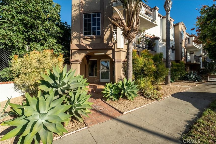 This stylish Zaferia condo offers a vibrant urban lifestyle in one of Long Beach’s most walkable and eclectic neighborhoods. Located steps from the city’s trendiest restaurants, artisan coffee shops, and independent boutiques, it blends modern comfort with a lively community feel. Loma Verde Condos is a boutique collection of just twelve architecturally distinctive residences. Rarely available, these homes offer unique layouts not often found in city living. This two-story residence features an open-concept design drenched in natural light with a secured lobby entry.



Privately positioned at the rear of the building, this two-bedroom, two-bath home offers privacy and an escape from the hustle of the city. Inside, the bamboo flooring, cozy fireplace, and French doors frame expansive views of the community gardens. The spacious balcony extends your living area outdoors—perfect for morning coffee or sunset gatherings.  



Upstairs, the primary suite features vaulted ceilings, a walk-in closet, and a versatile loft ideal for reading or creative work. The secondary bedroom, with its own private entrance, offers flexibility for guests or a home office. Thoughtful amenities include a full-sized laundry closet (washer and dryer included), brand new ($12,000) central air conditioning, and TWO PARKING spaces in the gated garage.  With direct access to the communal rooftop deck and no neighbors above, this residence captures the essence of relaxed, upscale Long Beach living—where design, comfort, and location meet effortlessly.