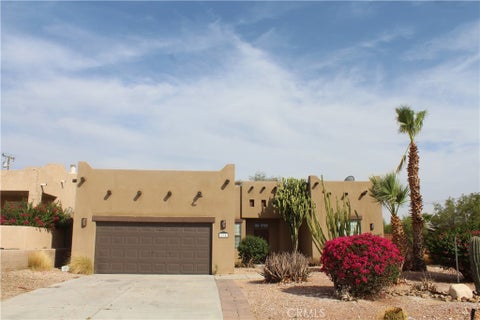 Photo of 12942 Cuando Way Way, Desert Hot Springs, CA 92240 (MLS # IG26156054)