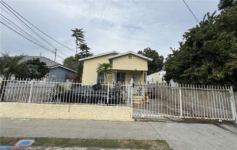 Photo of 1637 E 115th St, Los Angeles, CA 90059 (MLS # DW25264715)