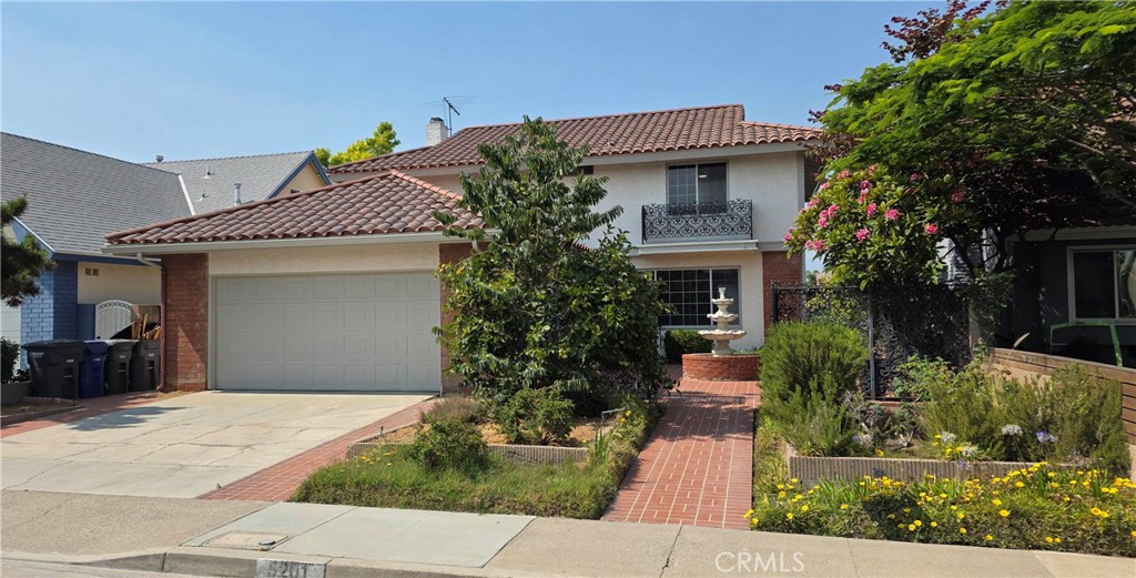 Rooted in one of La Palma's most desirable neighborhoods is this cherished 5-bedroom, 2.5-bathroom home, offering space, character, and thoughtful upgrades throughout. The Mediterranean-style kitchen features a built-in Sub-Zero refrigerator, custom cabinetry, and a garden window that fills the space with natural light. Original oak hardwood floors flow through much of the home, adding warmth and timeless appeal. The versatile floor plan includes four well-sized secondary bedrooms and a spacious main bedroom with room for a king bed, sitting area, or additional storage—ideal as a private retreat. Outside, enjoy a sparkling pool and patio area, perfect for entertaining or relaxing in the sun. Located within the highly rated Cypress School District and close to award-winning schools, parks, and shopping. Do not miss this opportunity to make this your home, today.