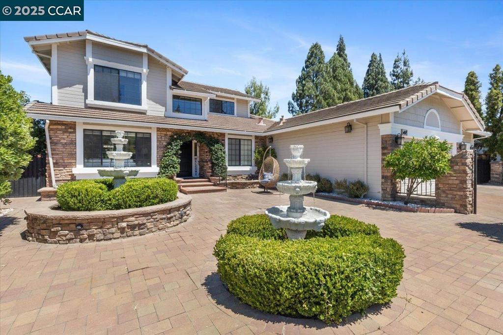 She’s BACK and better than ever! This stunningly upgraded 4-bedroom, 3-bath home truly has it all. With a dedicated office that easily doubles as a 5th bedroom or guest suite, the layout adapts effortlessly to your lifestyle. The entire interior has been freshly painted, and inspections and repairs—from top to bottom—have already been completed by the owner. This home is truly MOVE-IN ready—just bring your style and settle in! Inside, you'll find an open-concept layout featuring vaulted ceilings and skylights that bathe the space in natural light. The gourmet kitchen has an induction cooktop, double oven, quartz countertops, a bar area, and plenty of cabinet space-ideal for hosting and everyday living. The backyard is an entertainer’s paradise, with built-in bar, BBQ area, and hot tub-perfect for weekend gatherings or winding down after a long day. Located near top-rated schools and in one of Concord’s most desirable neighborhoods. Don't miss your chance to own this home. Schedule a tour TODAY!