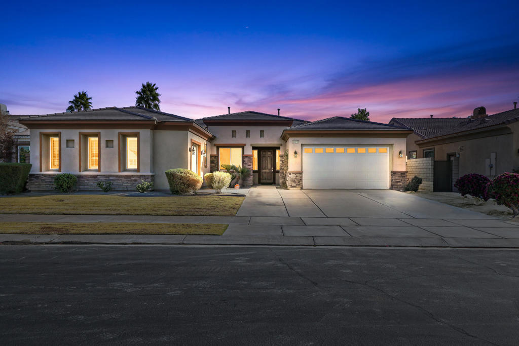 Stunning Home in the TERRA LAGO Community of Indio! This beautifully renovated residence is ideally situated near world-class golf courses, festivals, and an array of dining options. Step outside to your private backyard oasis featuring a sparkling saltwater pool, relaxing spa, built-in BBQ island, fire pit, and spacious outdoor dining area--perfect for entertaining or unwinding under the desert skies. Inside, the chef-inspired kitchen boasts stainless steel appliances, double ovens, and ample cabinetry. The bright and airy living room flows seamlessly into the family room, complete with a pool table and smart TV. Each bedroom offers comfort and convenience with smart TVs and generous closet space, while the bathrooms are tastefully appointed. The luxurious master suite features a king bed, twin pull-out bed, ensuite bath, and direct access to the backyard retreat. The ultimate game room is fully air-conditioned and designed for fun, showcasing a poker table, foosball, basketball game, arcade system, and smart TV. Community amenities include a scenic lake, fitness center, and clubhouse. With over $180,000 in upgrades, this 4-bedroom, 2.75-bath home offers 3,142 sq ft of luxurious living space. Additional highlights include a separate laundry room, 2-car garage plus single-car garage, and a paid-off solar system for energy efficiency and cost savings. This turnkey property is perfectly designed for short-term rental income or as a luxury retreat, making it a rare opportunity to own a high-demand investment home in Terra Lago.
