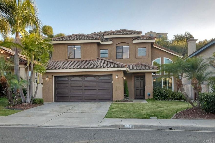 Welcome to this beautifully upgraded home in the desirable Bel Canto community of Rancho Del Oro, where pride of ownership truly shines. This light and bright open floorplan features vaulted ceilings, plantation shutters, newer windows, OWNED solar and an abundance of natural light throughout. The spacious kitchen with gorgeous quartz countertops, premium stainless-steel appliances and an abundance of storage seamlessly flow into the family room, creating an ideal space for entertaining or relaxing at home. The oversized primary suite offers an extended area for peaceful retreats with high ceilings and a spa-inspired ensuite bath with walk-in closet. Step outside to your private resort-style backyard, designed for year-round enjoyment. The custom hardscape with multiple areas for entertaining, built-in BBQ, and tranquil waterfall feature set the perfect stage for outdoor gatherings and quiet moments alike.  Enjoy cozy evenings by your outdoor fireplace and feel the extension of the outdoor living. Additional highlights include owned solar and central AC ensuring energy efficiency and savings, as well as an attached 2-car garage and low HOA dues. Situated in a quiet, well-maintained neighborhood close to top-rated schools, parks, and shopping, this home offers both comfort and convenience with timeless appeal. Experience the best of coastal North County living—schedule your showing today!