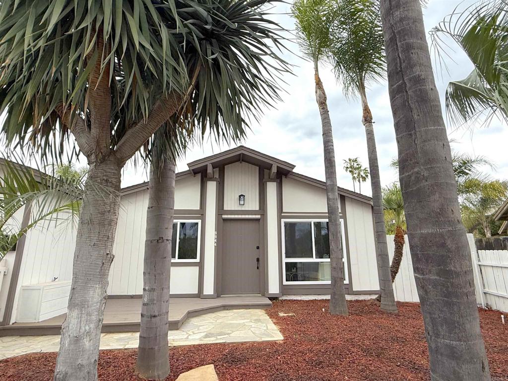 REDUCED PRICE! (& Motivated Seller!!) Welcome to Donner St.! You can't miss this Beautiful Renovated, Move-in ready, Single-story Home located in a great calm and quiet area of Santee. Enjoy the view to the Beautiful Mountains around this community. As you walk into the house you will appreciate the open-concept layout illuminated by the natural light entering from the big window in the living room. This home has a beautiful brand New Kitchen (New everything: New appliances, New Cabinets and New Quartz Countertop) with a kitchen island that gives it a stylish and contemporary look. Featuring 3 bedrooms and 2 full bathrooms (Perfect for a family). Enjoy a nice evening next to the cozy fireplace in the master bedroom that includes its own walk-in closet and an ensuite Bathroom. Ceiling fans in each room, recessed lighting throughout the house. New Ductless HVAC. Wait until you see the BIG backyard. This is the house that you don't want to miss. And NO Fees: No HOA and No Mello-Roos!!