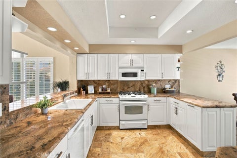 Photo of 684 Vista Lago Circle N, Palm Desert, CA 92211 (MLS # OC26202148)