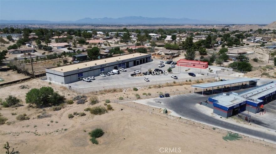 Now offering two spaces totaling ±4,150 square feet of versatile commercial space prominently located along Highway 18 in Apple Valley. Unit 1B is a ±2,690 SF warehouse space with two 12’ x 14’ roll up doors, small office, and restroom. Unit 10 is a ±1,460 SF space consisting of an office/showroom area with a full bathroom including a shower and a separate garage area. Zoned C-G (General Commercial), the property accommodates a wide range of potential uses, with this space previously used as a mechanic’s shop providing light automotive services.

Conveniently situated less than one mile from the busy intersection of Highway 18 and Apple Valley Road, the site benefits from exceptional visibility and exposure to an average traffic count of ±46,000 vehicles per day.