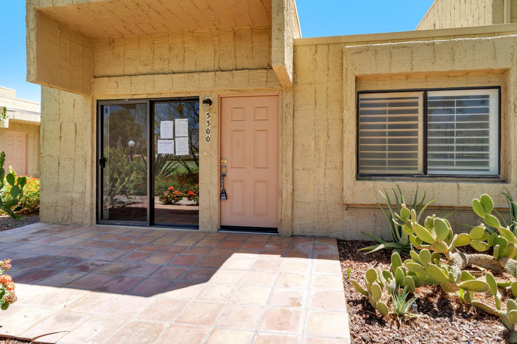 Welcome to 5300 Los Coyotes Drive, a beautifully maintained single-story condo nestled in the desirable Villas De Las Flores community of South Palm Springs. This 2-bedroom, 2-bathroom home offers 1,066 square feet of thoughtfully designed living space, with a bright and open layout that immediately feels warm and inviting. The living and dining areas flow effortlessly into a private patio, where you can enjoy peaceful mornings or sunset views with the backdrop of the surrounding mountains.The interior features a functional kitchen with plenty of cabinetry, spacious bedrooms with generous closets, and an en-suite bath in the primary suite. Central heating and air ensure year-round comfort, while dual-pane sliding glass doors bring in abundant natural light. During my visit, I was impressed by the tranquil atmosphere of the community--lush landscaping, friendly neighbors, and well-kept grounds truly stand out.Villas De Las Flores offers resort-style amenities including multiple sparkling pools, spas, tennis and pickleball courts, and a clubhouse. The HOA covers water, trash, roof maintenance, and exterior landscaping, making for easy, low-maintenance living. This home also includes a dedicated carport parking space and is located just minutes from local shops, restaurants, golf, and hiking trails. Whether you're looking for a full-time residence or a seasonal retreat, this Palm Springs gem is move-in ready and full of potential.