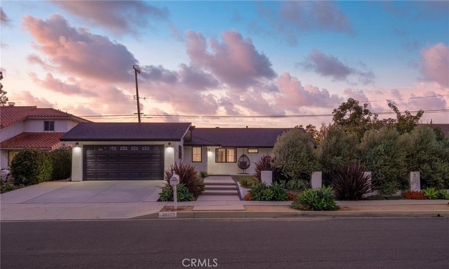 Discover the perfect blend of comfort, style, and coastal elegance in this beautifully reimagined single-level home in Rancho Palos Verdes’ desirable Los Verdes neighborhood. Extensively remodeled in 2020 and set on a 9,000+ sq. ft. lot, this 5-bedroom, 2.5-bath residence combines modern design with everyday comfort.
Natural light fills the open floor plan through floor-to-ceiling sliders that showcase ocean and sunset views. The updated kitchen features a large center island, Wolf appliances, and abundant cabinetry, opening seamlessly to the dining and family areas, perfect for hosting gatherings or enjoying family time.
The primary suite enjoys peaceful ocean views and opens directly to the backyard through a sliding door, complete with an en-suite bath. Outside, the thoughtfully designed landscaping enhances curb appeal, while the backyard and spacious patio provide a private retreat ideal for al fresco dining, play, and relaxation under the coastal sky.
Additional highlights include a newer roof, upgraded electrical panel, dual-pane windows, a dedicated laundry room, updated main sewer line, and direct garage access. Conveniently located near award-winning Vista Grande Elementary, scenic trails, shopping, and beaches—this home captures the essence of the Palos Verdes coastal lifestyle.