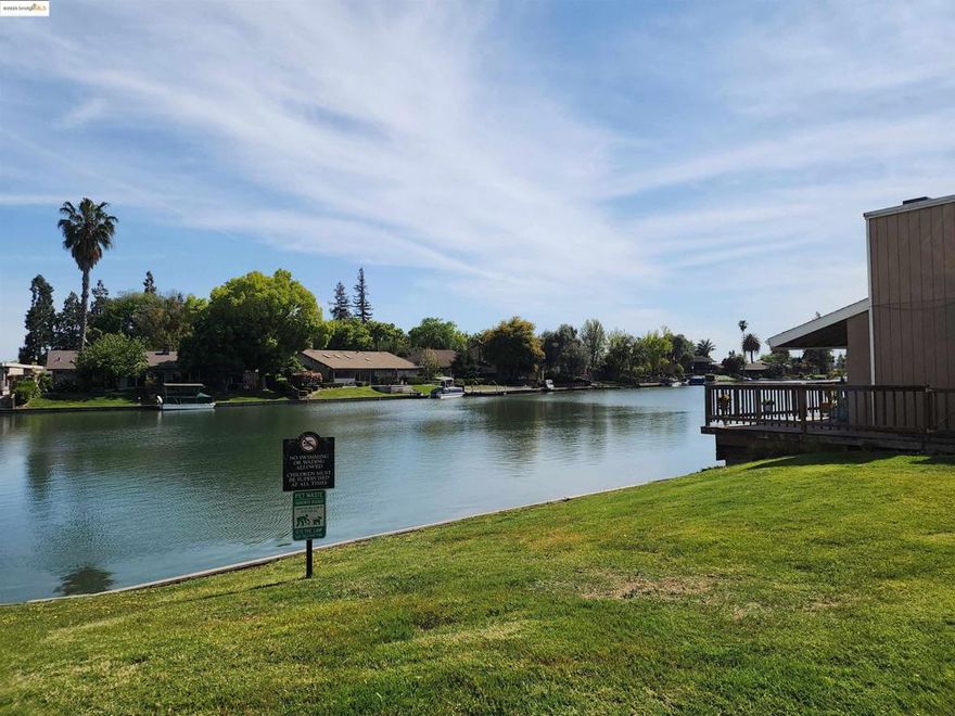 Discover the ultimate in convenience and recreation with this delightful 1-bedroom condo. Located in a gated community, you gain access to an incredible array of amenities, including refreshing pools and a picturesque private lake—perfect for your morning paddle or evening stroll. Its prime location near the San Joaquin Delta waterways is an outdoor enthusiast's dream, offering effortless access to boating, fishing, and scenic cruising, while quick access to trendy retail hubs keeps you connected to the best shopping and dining the area has to offer. This is more than a home; it's a vibrant, active lifestyle. HVAC replaced Oct 2024.