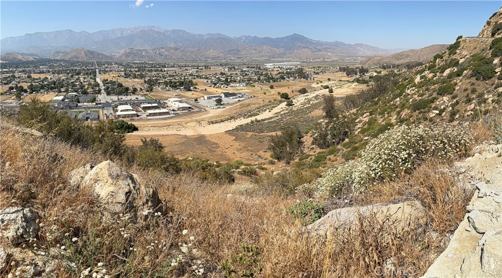 Escape to nature and build your dream getaway or investment property on this serene 1.1-acre parcel located just off Highway 243 in the beautiful community of Banning, California. This lot offers a rare combination of accessibility and natural beauty.
With easy access from a paved road, this gently sloped lot has a great view of the city with the hills behind you. Whether you're looking to develop a custom home, install a manufactured home, or hold the land as a long-term investment, this lot offers a flexible opportunity. Power is nearby, and zoning allows for residential use—verify with Riverside County for specific plans.
Enjoy cool summer breezes, crisp winters, and close proximity to Idyllwild, Palm Springs, and downtown Banning. Just minutes from hiking trails, mountain recreation, and the San Bernardino National Forest, this is an ideal retreat for nature lovers and outdoor enthusiasts