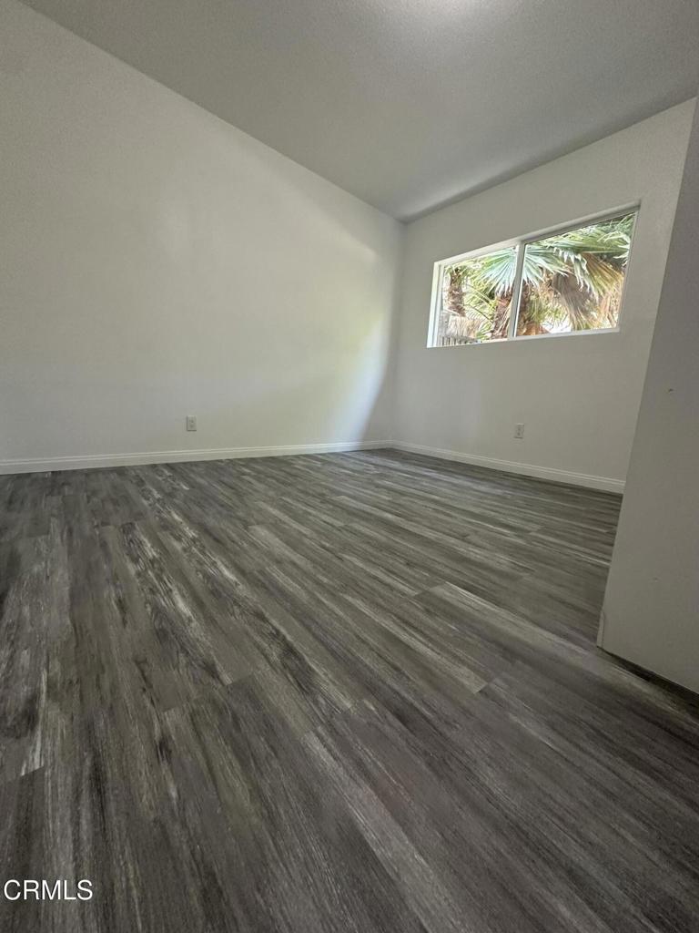 Tucked away 3 bedroom apt with one car garage for one car plus additional 3 more parking spaces. this unit has a front private patio.