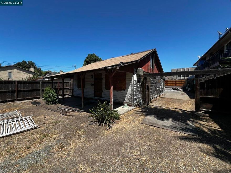 Unique unusual property sandwiched in between apartment buildings just off Monument Blvd down small Lane. Duplex or 4 plex potential zoning? Large lot, old house that has been boarded up and vacant for 25 years. Not sure how many bedrooms and bathrooms exist; county tax rolls say 1&1 but may have more. I will have access to interior of home this coming week. Large lot, old house, gated and fenced, perfect for hermit type, or contractor type, tons of storage areas. Gated and secure. Call LA for details.