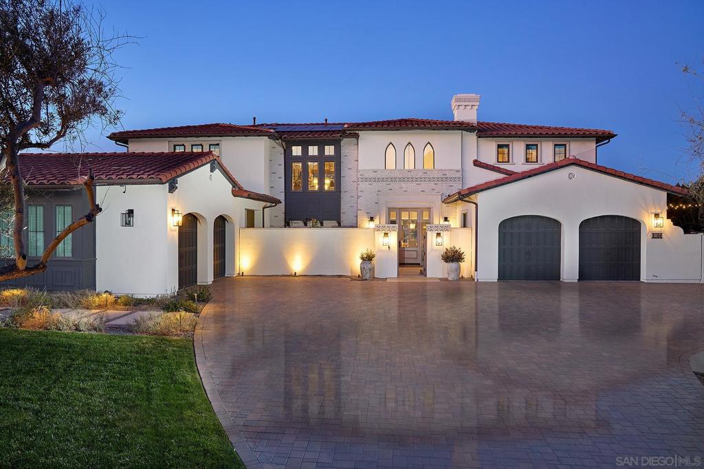 Luxury living at its finest. Located in the highly sought-after gated community of the Lakes Above Rancho Santa Fe, this beautiful estate has been customized throughout. As you step through the private courtyard and front door you will be impressed by the unique open concept and breathtaking mountain views. The gourmet kitchen features high end appliances including two Thermador 30” column refrigerator/freezer units with touch opening and soft close, Thermador wine column with separate temperature zones, built in Viking dishwasher, custom designed Viking Range and hood. The expansive island even includes a pet food and water station. The living room seamless blends indoor and outdoor living space and features a see-through glass fireplace. Additionally, downstairs there is an attached guest casita with private kitchenette and living space. Upstairs, the primary suite features stunning views, private balcony, and an expansive walk-in closet with custom design from California Closets. The en suite is a true retreat and boasts dual vanities, walk-in shower, and soaking tub. The loft separates the primary suite from the two additional bedrooms with en suites upstairs. The resort like backyard is perfect for entertaining. Features include custom outdoor kitchen, two fireplaces, an oversized gas firepit with ample seating and pickleball court. Sparkling infinity edge pool with Baja shelf and spa complete the oasis. You will love the seclusion of the quiet cul-de-sac and primer view lot. The Lakes is conveniently located between Interstate 5 and 15 with easy access to shopping and restaurants. Poway Unified School District with Del Norte High School and Design 39 campus nearby.