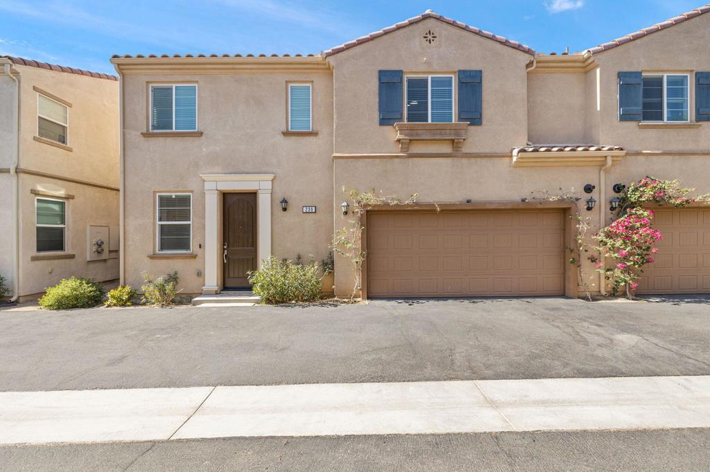 Welcome to your perfect desert retreat! This beautifully appointed 4-bedroom, 3.5-bathroom condo is nestled in a gated community offering resort-style amenities, including pools and spas, dog parks, playgrounds, a professional fitness center, billiard room, and more -- all with low HOA fees and located on fee simple land.Inside, you'll find a thoughtfully designed layout featuring two primary suites -- one on each level -- ideal for privacy and flexibility. Two additional upstairs bedrooms and a spacious upstairs retreat (approx. 13' x 15') provide ample room for guests, a home office, or media space.The open-concept kitchen is perfect for entertaining, complete with stainless steel appliances, granite countertops, a central island, and generous dining space. Recent upgrades include a brand new A/C condensing unit, LED can lighting throughout, and five new ceiling fans with LED lights, enhancing both comfort and energy efficiency.The upstairs laundry room adds convenience, while the sun-soaked south-facing patio offers gorgeous mountain views and easy access to a nearby pool. Additional highlights include a 2-car garage with direct access, Tesla and EV chargers, extra overhead storage, and a location that seamlessly blends privacy and community living.Don't miss the chance to make this move-in-ready home your own and experience the best of Palm Desert living.