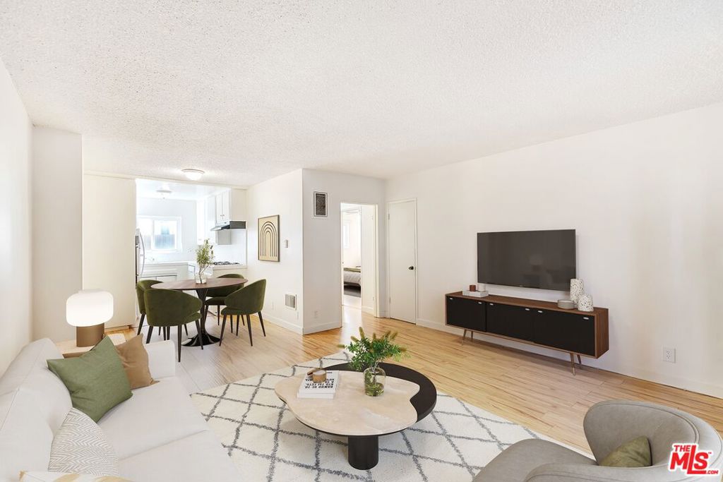 This quiet first-floor apartment checks all the boxes! Are you trying to land yourself a sweet 1-bedroom near the Westside/Cheviot Hills? Are you sick of huge faceless apartment complexes? Looking for something a little more quaint? Then this one might be for you! This roomy, open-floorplan unit features wood laminate flooring and tons of storage throughout! The kitchen is fully-loaded with a fridge, separate gas oven and cooktop, gas stove, and dishwasher. And don't miss the vintage tiling in the kitchen and bathroom. The bedroom is generously sized and includes a walk-in closet and built-in vanity. Ah, fresh air! It's nice to have your very own patio- we can see you enjoying your morning coffee or evening aperitif before dinner. And keep cool on the inside with the included wall A/C unit. The complex has laundry and comes with 1 parking space, but there is also plenty of street parking for your guests. Not to mention, you're steps to Fox Studios, Cheviot Hills Rec Center, Rancho Park Golf Course, and a short drive to Century City and tons of other Westside delights! (Sorry, no dogs but will consider a cat with add'l pet rent)