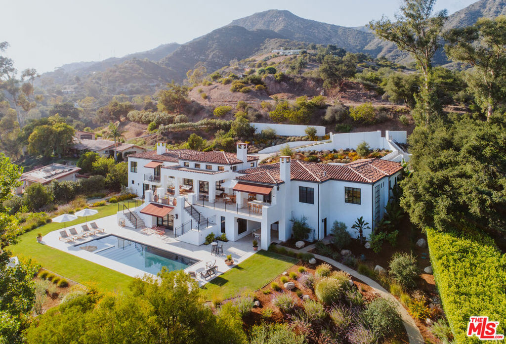 This extraordinary, Mediterranean-inspired villa is an oasis & from this vantage point, ocean & island views are endless. Showcasing nearly an acre of polished, landscaped grounds & resort-caliber amenities, this gated villa embodies everyday Californian luxury in a private setting. A beautifully landscaped driveway leads to this approx 6,240 sq. ft. residence, which boasts a main level primary suite, tall ceilings, & seamless indoor-outdoor flow. Newly built in 2020, the thoughtfully designed home is ideal for year-round entertaining, with an outdoor kitchen, peaceful gardens, & pool & spa adjacent to a lower level 1 bed/1 bath cabana. Situated within the highly coveted Cold Spring School district, this idyllic haven is the perfect place to experience your own slice of paradise.