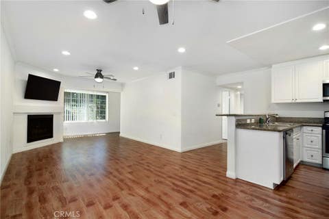 Photo of 5525 Canoga Avenue #124, Woodland Hills, CA 91367 (MLS # SR26169195)
