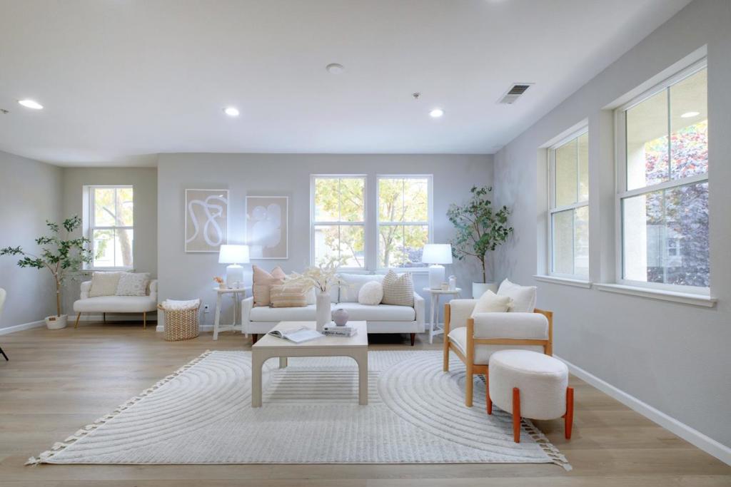 *Discover modern living at its finest in this beautifully updated 2-bedroom, 2.5-bath end-unit townhouse style home, perfectly positioned in a serene neighborhood. *As a desirable corner unit, this home welcomes abundant natural light through double-pane windows. *The newly installed LVP flooring adds warmth and elegance to the living spaces, while the fresh paint throughout gives the home a bright, contemporary feel. The stylish kitchen is a chefs delight, featuring dreamy white cabinets and stainless steel appliances. *Step outside to the private patio where you can relax or entertain guests. Both bedrooms are located on the same floor, offering privacy and comfort, with the convenience of in-unit laundry. *The home also boasts a 2-car garage for secure parking and additional storage. The community features a BBQ area, a dedicated dog walking space, and a playground for residents to enjoy. *Near the upscale Villa Sport Athletic Club and Spa, Penitencia Creek Park, and VTA Light Rail. Situated just minutes from coffee shops, restaurants, and popular retail destinations like Safeway and Target. Easy access to major freeways and top tech firms such as Google, Amazon, Apples future North San Jose campus, and the BART station.