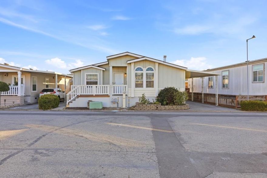 Welcome to this spacious and beautifully maintained home. This 3-bedroom plus den home offers flexibility and comfort, with the den easily convertible into a 4th bedroom to suit your lifestyle needs. Step inside to an expansive open floor plan featuring a generous living and dining room combination, perfect for entertaining and daily living. The large primary bedroom retreat provides an ideal space for a home office, relaxing lounge, or optional 4th bedroom conversion. Enjoy the charming front porch, ideal for morning coffee or evening wind-down. Thoughtfully updated throughout the years. New garbage disposal, updated water heater, added recessed lighting, additional outlet for generator, central heating and A/C, updated appliances, warm, durable hardwood cabinetry throughout, spacious laundry room with washer, dryer, and space for an additional refrigerator or freezer. Low-maintenance backyard, carport fits up to 3 vehicles & custom-built storage shed. Located near the community pool, clubhouse, and guest parking, this home offers both comfort and convenience. Fantastic location with easy access to Highways 101, 237, and 85close to major tech companies, Levis Stadium, shopping, dining, and VTA Light Rail.  Low space rent to new owners $1,495/mo.