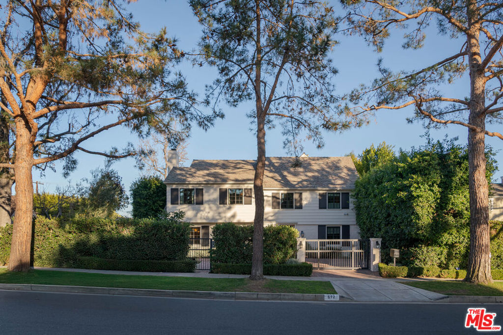 Located on a prime tree-lined street in Beverly Hills' coveted Flats.