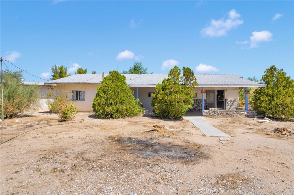 CALLING ALL OWNER OPERATORS...GIANT FLAT 2.5 ACRE LOT on PAVED ROAD is PERFECT for Your TRUCKS, RV, Boat, Trailers or Horses - PLENTY of ROOM to Add a WORKSHOP or ADU!! ** Tons of POTENTIAL with this SPRAWLING SINGLE STORY RANCH Home!! GREAT Floor-Plan Offering 1,800sqft with 2 Large Bedrooms and 1 FULL Bathrooms * * Spacious Living Room * * Large Galley Kitchen with Breakfast Counter for the Kids and In-Kitchen Dining Area * * (2) Nicely Appointed Bedrooms with HIGH PITCHED Ceilings * * Bathroom with RAISED Tiled Bathtub and Walk-In Shower * * SUPER-SIZED Full-Length Covered Patio is PERFECT for Family Gatherings * * Storage Shed and Workshop Space * * Large 2 Car Tandem Garage with PLENTY of ROOM for Additional Parking * * Covered Front Porch * * NEW ROOF has Been Installed Main House, Garage and Outbuilding * * Water Meter Installed * * Electric will need PERMIT to connect to Edison ** Property only has Septic tank permit ** CLOSE TO BIG BEAR - Only 23 Miles * * SUBMIT ALL CASH OFFERS - SELLER IS MOTIVATED!!