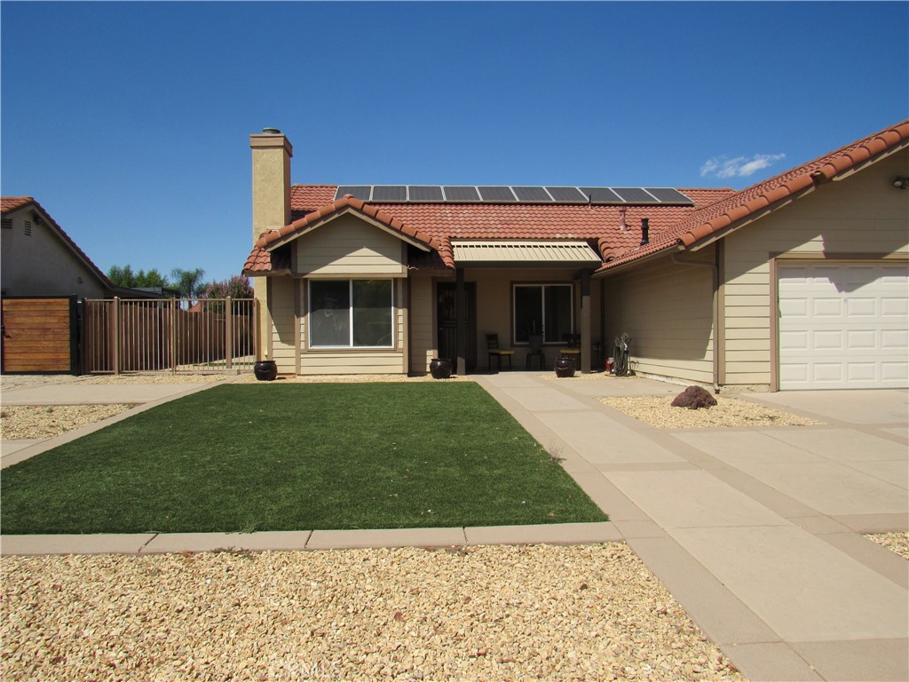 **Charming 3 Bed, 2 Bath Home in Desirable Family-Friendly Neighborhood**
This well-Built home, perfect for families or anyone seeking comfort and functionality. The interior **needs new carpet and fresh paint**, giving you the opportunity to customize it to your taste.
Enjoy the outdoors with a **covered Alumawood patio complete with ceiling fan**, ideal for entertaining or relaxing year-round. The backyard also features **stamped concrete, a storage shed**, and **RV parking**—a rare find!
Additional highlights include a **tankless water heater**, providing energy efficiency and endless hot water. Also updated windows ,and A puting green .
Don't miss the chance to turn this property into your dream home!