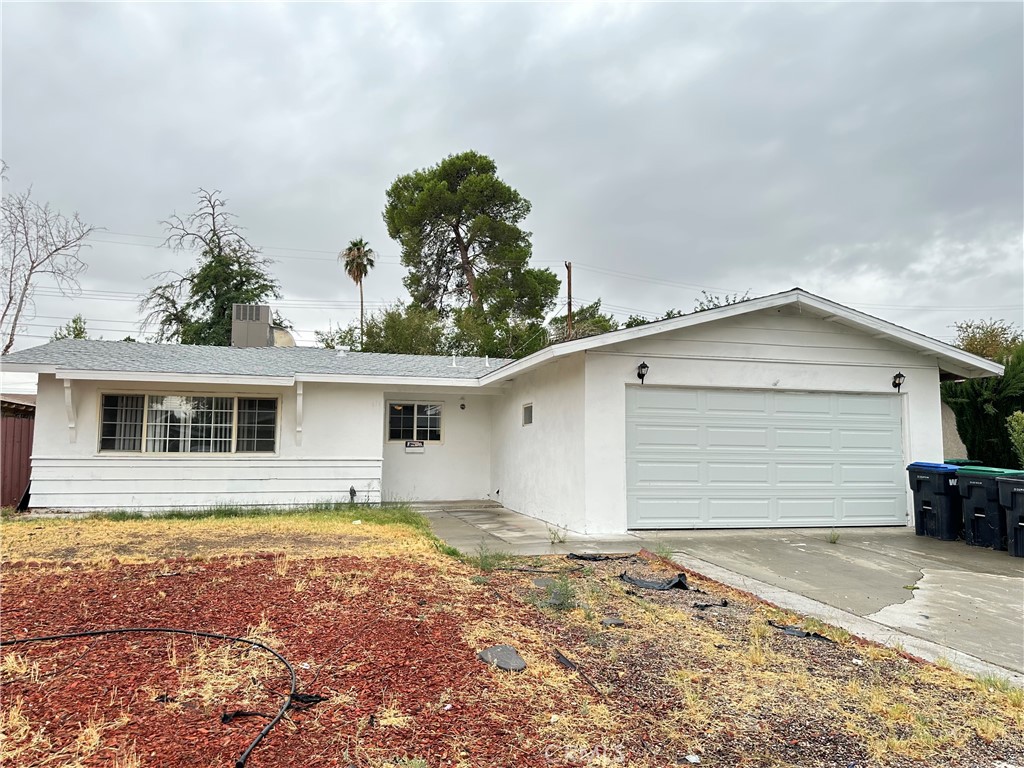 Welcome to this beautifully updated, move-in ready home, ideally located on a quiet cul-de-sac. The property has been recently refreshed throughout, featuring freshly painted rooms, new kitchen cabinets, modern countertops, laminate flooring, and ceiling fans in most areas. The master bathroom showcases a large walk-in shower, and the spacious backyard includes a concrete slab, pergola, paved areas, and ample space for entertaining or relaxing. Additionally, there is an attached two-car garage, which has the potential to be converted into a junior ADU.