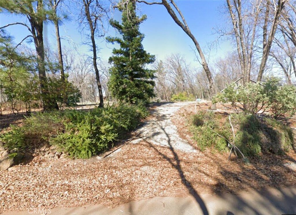 Welcome to Lower Magalia's sought-after neighborhood, where 30,927 sf of vacant land await your dream home vision. This property, once home to a beautiful 2,666 square foot, 3 bedroom, 2-bathroom residence, offers a prime opportunity to build anew. The underground utilities already in place. Come see this great property!