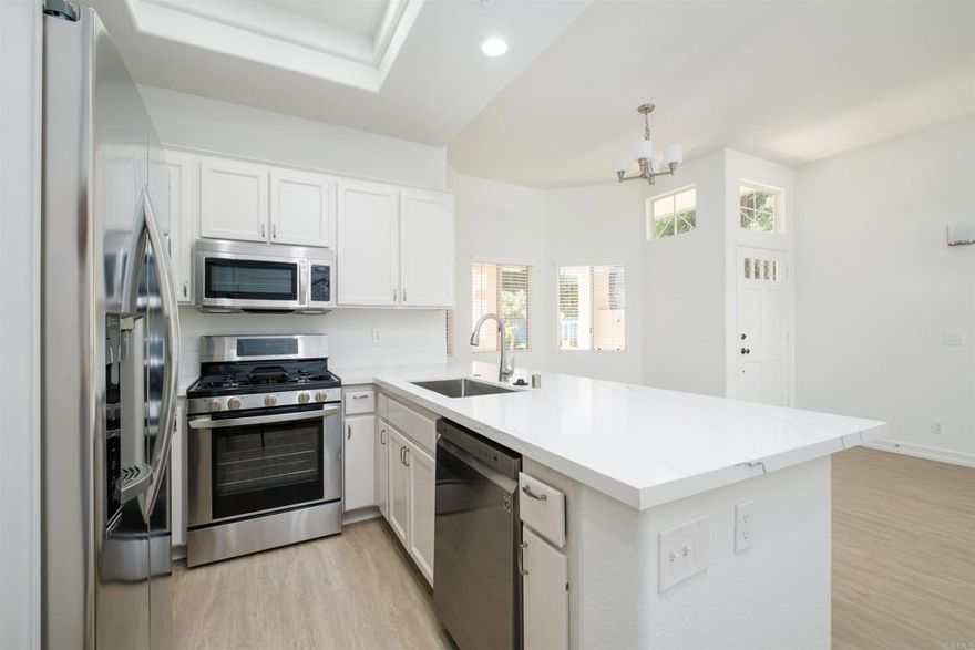 ** PHOTOS ARE REPRESENTATIONAL AND ARE NOT OF THE EXACT UNIT**  Downstairs, Corner Condo, comes with one car garage and an assigned parking spot!  Brand-new stainless-steel appliances! Brand new carpet in living room and bedrooms.  View more photos here: belmondocondo.com  The lifestyle you want with the home you’ve always dreamed of is waiting for you at Bel Mondo Condos in Rancho Santa Fe, CA. Located in Whispering Palms, our picturesque community is just minutes from restaurants, shopping, parks, and entertainment. Del Mar’s beaches are only a few miles away. Bel Mondo Condos is an irresistible combination of quality and charm.  An unmatched level of style and comfort distinguishes our residences. Our spacious condos present a selection of four, two bedroom floor plans. Each home is appointed with an attached garage, breakfast bar, fireplace, 10-foot ceilings, and in-home washer and dryer. Relax on your balcony or patio or enjoy your favorite meals in your fully equipped kitchen.  The comfort doesn’t end when you leave your home. We’re dedicated to providing a relaxing atmosphere for an enjoyable lifestyle. Take a dip in our shimmering swimming pool or enjoy a walk with your pet around our lushly landscaped community. Experience a new standard of living at Bel Mondo Condos.