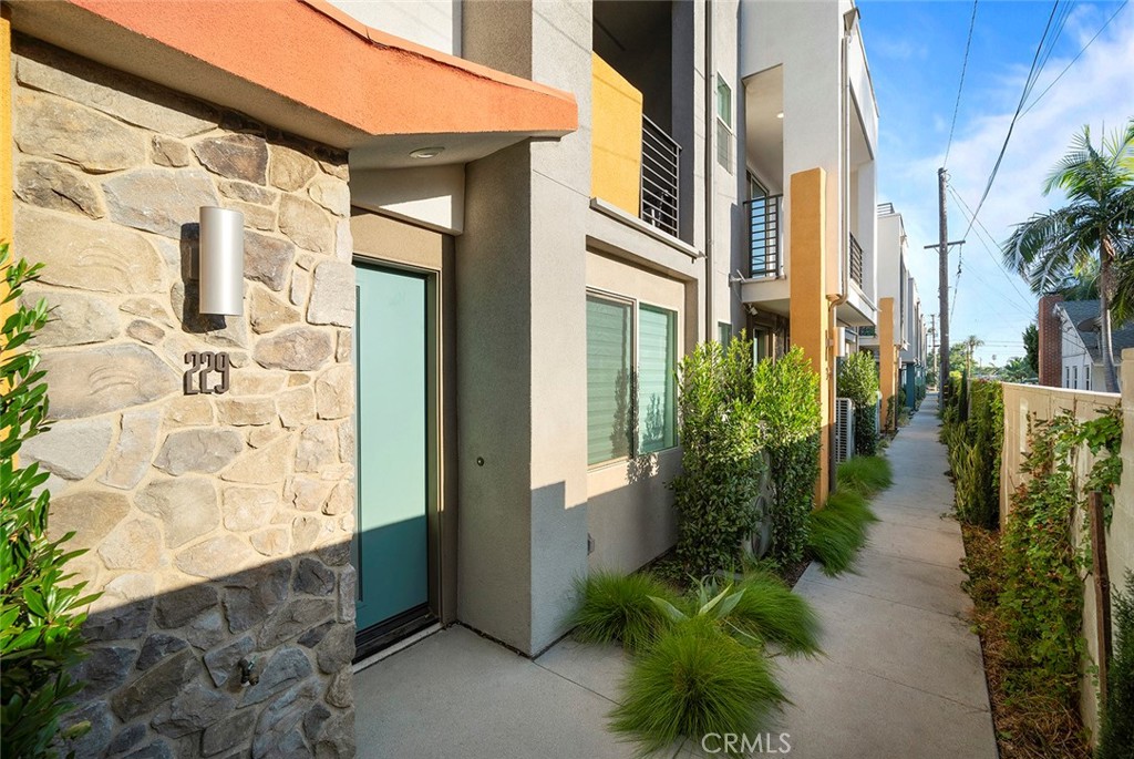 Welcome to this stunning modern tri-level townhouse built in 2023, ideally located in the heart of Covina with excellent access to everyday conveniences and transportation. This thoughtfully designed 3 bedroom, 3.5 bathroom home offers the perfect blend of functionality and contemporary style. The first floor features a private en-suite bedroom, ideal for guests, in-laws, or as a home office. The main living area on the second floor boasts an open-concept layout with a spacious living room, a modern kitchen with stainless steel appliances and quartz countertops, a dining area, a private balcony, and a convenient half bathroom. On the third floor, you'll find two additional en-suite bedrooms, including a spacious primary suite, as well as a laundry room for added convenience. Located just minutes from the 10 Freeway and within close proximity to major supermarkets, Asian grocery stores, restaurants, and retail centers, this home offers a lifestyle of ease and accessibility. With energy-efficient features, including solar that will be paid off when closing, central A/C, and an attached garage, this turnkey property is a rare opportunity you don’t want to miss.
