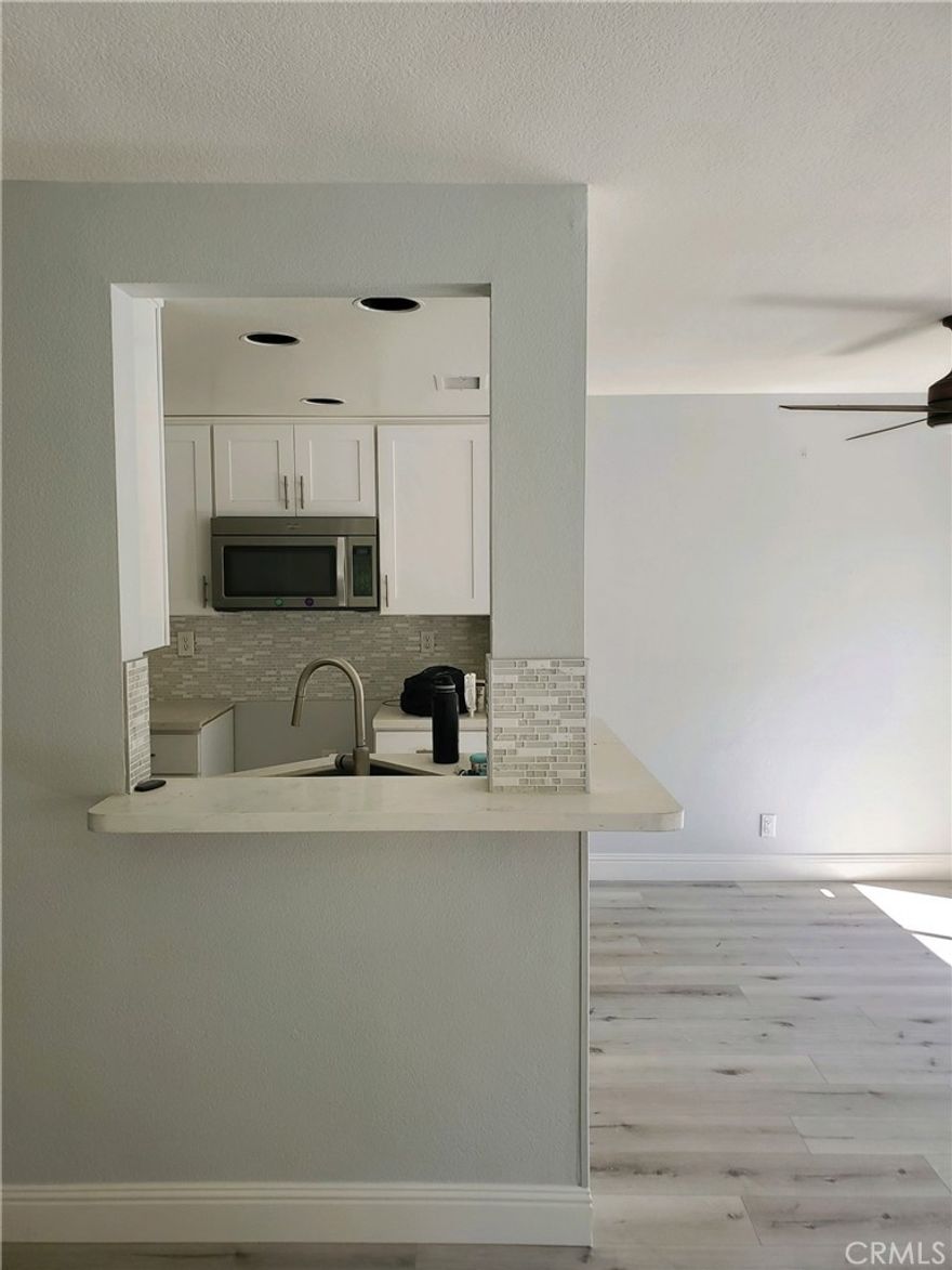 Welcome to your new retreat at 27446 Jasmine Avenue in Mission Viejo! This inviting 3-bedroom, 2.5-bathroom end-unit townhome offers 1,200 square feet of comfortable living space, perfect for those looking to lease a charming and cozy home with added privacy. As you enter, you’ll notice the brand new flooring and fresh paint on the main level, giving the space a bright and modern feel. The open layout creates a seamless flow between the living, dining, and kitchen areas, making it easy to entertain or relax. Nestled at the end of a cul-de-sac, this home provides a peaceful environment. Step outside to your private backyard, a perfect spot for morning coffee or evening gatherings. The property also boasts an attached two-car garage for your convenience. You'll appreciate the convenience of air conditioning for those warm days, and the community amenities, including a pool and spa, for ultimate relaxation. Tenants will also enjoy access to the wonderful Lake Mission Viejo, offering additional recreational opportunities and scenic beauty. Situated in a tranquil neighborhood, this home offers the serenity you desire while being close to everything you need. Take advantage of the new landscaping, which enhances the curb appeal and creates a welcoming atmosphere. This lease opportunity won’t last long. Come see this delightful home and discover why 27446 Jasmine Avenue is perfect for you! Showings to begin after 10/27/25.