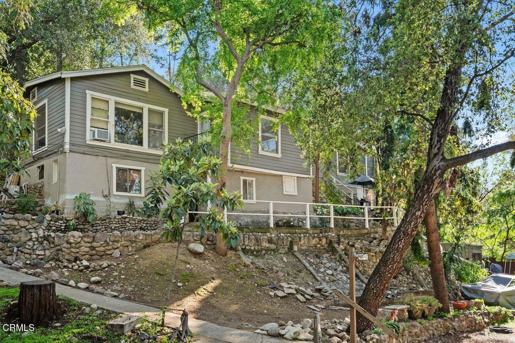 BACK ON THE MARKET! Discover the endless possibilities with this unique triplex located in a serene, woodsy setting of South Pasadena. This property features three distinct units: a cozy studio apartment, a spacious one-bedroom unit, and an inviting two-bedroom unit, catering to a range of occupants or rental opportunities.Set on an expansive lot, the property's potential for development is boundless. Whether you're considering a modern renovation of the existing structure or envisioning a complete re-development, this property sits in an overlay zone and presents one of South Pasadena's best development opportunities.South Pasadena is renowned for its excellent schools, making it an ideal location for families. The area offers an abundance of walking trails, perfect for nature lovers, and boasts a golf course and equestrian facilities nearby for those who love horseback riding. With easy access to public transportation and being just minutes from DTLA, Burbank and Old Pasadena, this triplex offers both tranquility and convenience. Note: some photos are virtually staged.