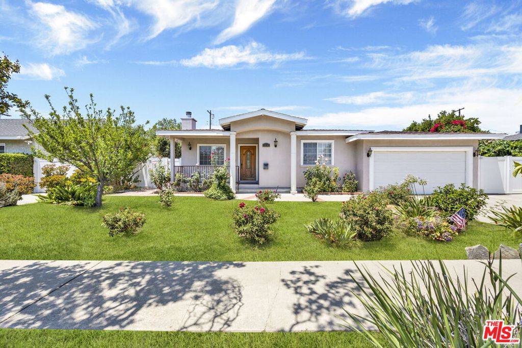 Welcome to beautifully updated and freshly painted residence nestled west of 405 freeway and just a couple of blocks from Granada Hills. This stunning home offers a seamless blend of contemporary design and classic charm, situated on a picturesque tree-lined street. Step inside to discover a spacious layout featuring four bedrooms and four and a half bathrooms spread across 2,250 square feet of living space. The home is bathed in natural light, enhancing its airy and inviting atmosphere. The large kitchen, complete with a walk-in pantry and breakfast nook, serves as the heart of the home ideal for culinary enthusiasts and gatherings. The living areas boast stylish tile floors throughout the house, and the comfort of air conditioning ensures a pleasant environment year-round. You'll appreciate the abundance of closets throughout the home, providing ample storage solutions. The primary suite is a true retreat, offering a large walk-in closet, along with a bathroom that features both a tub and a standalone shower for ultimate relaxation. Venture outdoors to the serene and beautifully landscaped backyard, a perfect retreat for relaxation and entertainment. The generous lot size of approximately 7,800 square feet offers ample space for outdoor activities and gardening. Situated just a few blocks from the vibrant community of Granada Hills, this property enjoys a great location with easy access to the freeway, shops, restaurants, local amenities, and attractions. Embrace a refined lifestyle in a home where sophistication meets comfort.