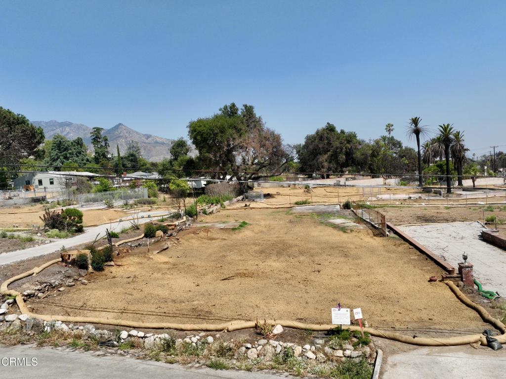 Prime Altadena flat 7560 sq ft lot, sited just west of Lake avenue and above Altadena's historic Christmas Tree Lane now available for your consideration. This special property was previously home to a three bed, one bath 1593 sq ft character house. Army Corps of Engineers phase 1 and 2 clean up have been completed. Don't miss this opportunity to rebuild and be a part of Altadena's upcoming golden age.Buyers are responsible for independently verifying all aspects of the property including zoning, lot size, permitting, and rebuilding requirements with Los Angeles County. This Farnsworth Park adjacent home was lost in the Eaton Fire, and the property is being sold in as-is condition as land only. Please do not enter the site - drive-by only.