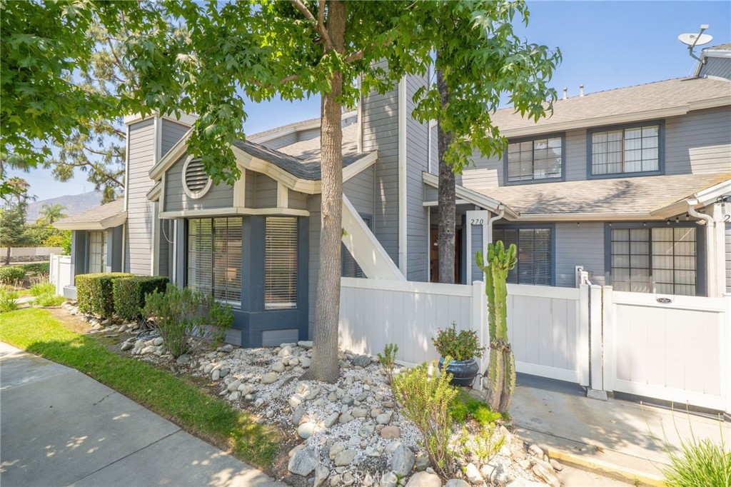 Nestled in the tranquil, foothill-framed Crystal Canyon Community of North Azusa, this beautifully remodeled 2-bedroom, 2.5-bath townhome spans 1,375?sq?ft of thoughtfully updated living space. A gated private patio welcomes you inside to discover soaring vaulted ceilings, a cozy fireplace, and airy front windows that bathe the living room in natural light. The adjacent kitchen is a chef’s dream—brand-new white cabinetry, luxurious quartz countertops, and stainless-steel appliances (gas range, microwave, dishwasher, refrigerator) make entertaining a breeze. A convenient half bath rounds out the main level. Upstairs, both generous bedroom suites offer walk-in closets and fully remodeled bathrooms. The primary suite elevates the retreat with double door entry and a spa-style shower. A hallway loft and extra storage add flexibility to your lifestyle. Throughout the residence, enjoy fresh interior paint, elegant new vinyl flooring, modern lighting, new interior doors, and an upgraded sprinkler system. Central air and heat ensure year-round comfort. The attached 2-car garage includes laundry hookups, with washer and dryer included, with direct access into the unit. Outside, lush landscaping, greenbelts, and mountain views surround you. Community amenities, pool, spa, tennis courts, and ample guest parking, enhance everyday living. Ideal for students or commuters, you’re close to Azusa Pacific University, Citrus College, downtown shops and restaurants, and enjoy quick access to the Metro Gold Line.