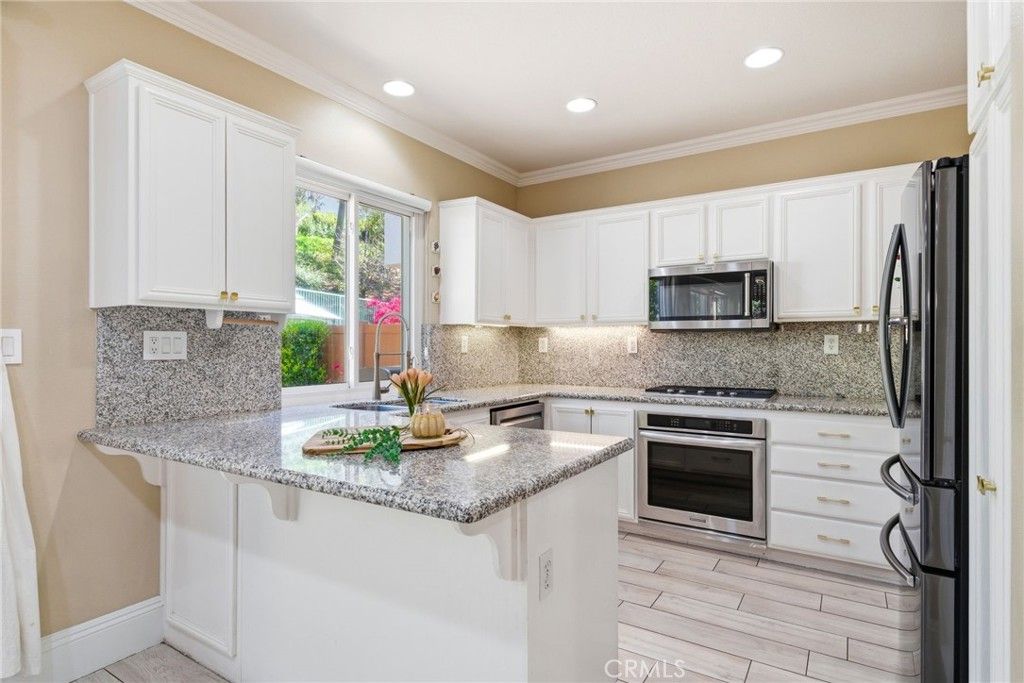 Photo of 51 Radiance Ln, Rancho Santa Margarita, CA 92688 (MLS # OC26069527)