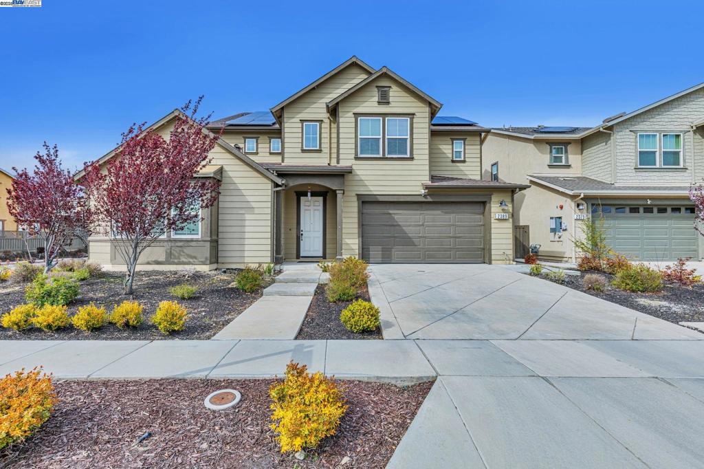 Welcome to this stunning corner lot home nestled in the charming Ellis Town community of Tracy. This spacious residence features 5 bedrooms and 3.5 bathrooms, including a private downstairs bedroom and bath. Large windows provide ample natural light throughout the home. Upstairs, you'll find a spacious loft, 2 additional bedrooms, and a grand master suite complete with a walk-in closet, tub, and shower. The property offers plenty of parking for visiting family and friends on the side and front streets. Inside, you'll discover numerous upgrades, including a kitchen equipped with stainless steel appliances, a spacious pantry, and a large island adorned with granite countertops. The open layout encompasses a generous great room and kitchen, making it ideal for entertaining or family gatherings. The beautifully landscaped front yard enhances the home's curb appeal, while the spacious backyard, featuring a California room, is perfect for family get-togethers. The community boasts several parks, including a dog park, and is conveniently located with easy access to freeways and the ACE train.