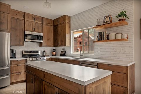 Photo of 32425 Snowshoe Ln, Running Springs, CA 92382 (MLS # IG26049526)