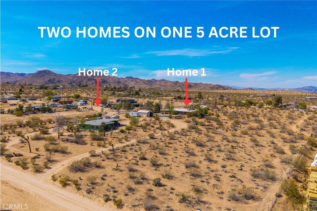 2 Homes on 5 Acres with Workshop & RV Hookups in Flamingo Heights – A Rare Desert Compound! Located in the highly desirable Flamingo Heights area of Yucca Valley, this incredible 5-acre property spans an entire block and offers two detached single-family homes, 2 RV hookups, a detached workshop, and multiple access points—making it the ultimate setup for multi-generational living, investment, or income potential. Each home has its own separate access from different roads, along with driveways connecting the two, offering both privacy and flexibility for shared or independent use. Main Home – Approx. 2,139 Sqft | 3 Bed, 2 Bath As you enter the main home, you're welcomed by a formal living room with soaring vaulted, beamed ceilings, currently used as a game room. The heart of the home is a massive open-concept space that includes a spacious kitchen, dining area, and second living room—ideal for entertaining and everyday living. The kitchen features abundant cabinetry and storage, while the rest of the home offers three oversized bedrooms with plenty of closet space. The guest bathroom is centrally located and well-appointed with all the essentials. The primary suite is especially large, featuring both a walk-in closet and a second full-size closet. The ensuite bathroom offers retro charm and is exceptionally well-maintained, with a large jetted tub and a walk-in shower. Workshop, RV Hookups & Storage At the center of the property sits a metal workshop with a concrete floor, ample lighting, and room for tools, projects, or off-road toys. There are also 2 full RV hookups, several storage sheds, and ample room for trailers, boats, or additional equipment. Second Home – 2 Bed, 1.25 Bath Approx 1254 sqft | Separate Meter & Entry. The second home has its own electric & water meter, private access, and covered carport parking—making it ideal for rental income or guest accommodations. Inside, you'll find updated finishes, mini-split systems for efficient heating and cooling, two good-sized bedrooms, and its own laundry hookups. With room to grow, unmatched versatility, and so many functional upgrades, this property is truly a rare find in the high desert. Perfect for multi-generational families, owner-occupants with rental income, or investors looking for a turnkey desert compound. Opportunities like this don’t come around often—schedule your private showing today!