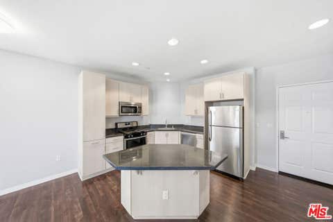 Photo of 1408 W WASHINGTON Boulevard #303, Los Angeles, CA 90007 (MLS # 26866707)