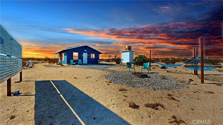 Remodeled 1 bedroom 1 bath home on five acres. The perfect tiny home in the desert with a ton of charm. Inside is inviting and fun with unique remodel including, furniture, decor, tile shower bathroom and ductless heating and air. Outside you have five sprawling acres that include a bbq, fire pit, Hammocks, privacy fencing, gravel pathways, old water tower, a shipping container, and lots of open land to make your own. Connected to City water, Electricity and Solar. Easy to get too and not far from paved roads.