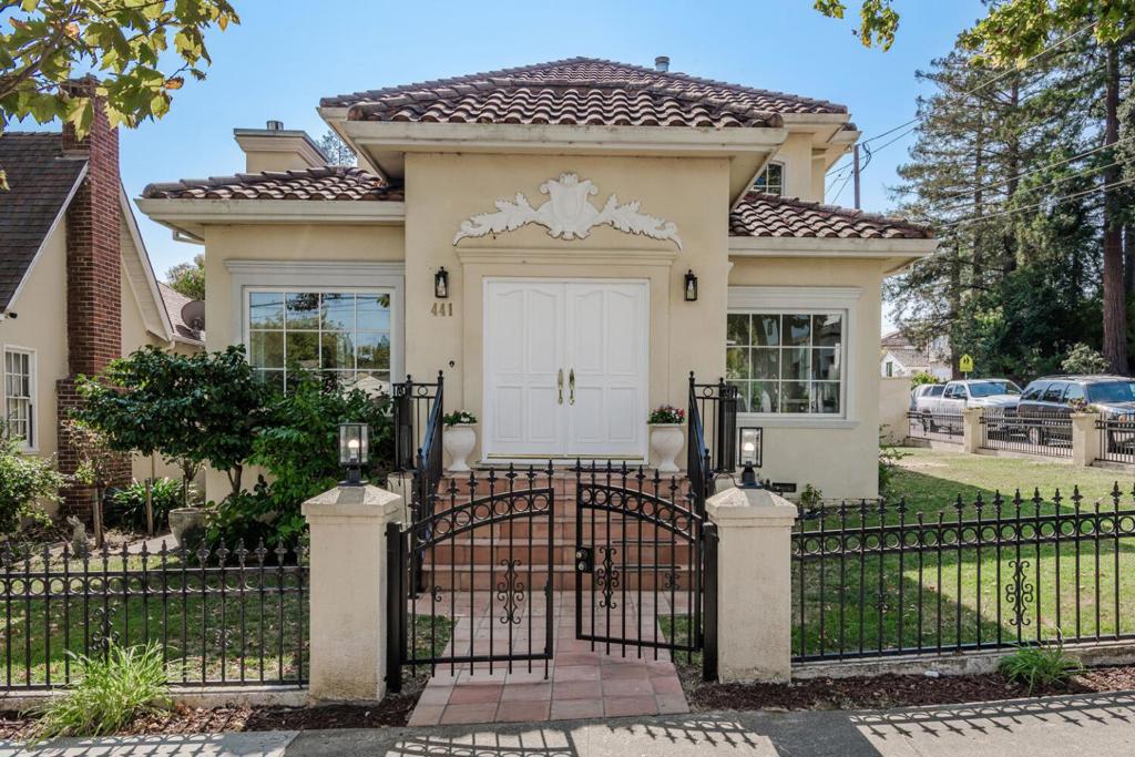 Welcome home to this inviting corner-lot residence on a charming tree-lined street. Offering 3 bedrooms and 2.5 bathrooms, including two primary suites upstairs and an additional bedroom on the main level, this home offers exceptional versatility and comfort. Entertain in the spacious living room with a warm fireplace and flow easily into the formal dining room. The well-appointed kitchen features new stainless-steel appliances, quartz counter tops and abundant cabinet space. There is a bonus room downstairs which is great for an office or playroom. The primary suite is a true retreat featuring dual walk-in closets and a luxurious ensuite with a jetted tub, dual vanity and separate stall shower. The second primary suite also offers a private bath and a spacious walk-in closet. High ceilings, elegant finishes, and the warm character flow throughout the living areas, creating a sense of openness and sophistication. This exceptional home blends comfort, style, and function an ideal retreat for both everyday living and entertaining.