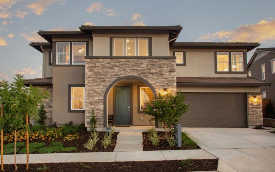 Homesite 48 | Plan 3. This beautifully appointed furnished model home is one of the final opportunities at Brix at Glen Loma Ranch. Offering approximately 3,336 sq. ft., this two-story design features 4 bedrooms and 5 baths with an innovative layout that blends openness and functionality. The main level includes a ground-floor bedroom and full bath, plus an optional GenSmart Suite layout, ideal for multi-generational living or extended guest stays. The gourmet kitchen features quartz countertops, island with sink, built-in appliances, walk-in pantry, and seamless flow into the dining and family areas. Upstairs, the expansive Primary Suite includes a retreat, walk-in closet, and spa-inspired bath. Additional highlights include upper-level laundry, multiple outdoor living spaces, an outdoor kitchen and fireplace, multi-zone HVAC, tankless water heater, smart home features, fenced yard, and views of the western foothills. Brix at Glen Loma Ranch offers parks, miles of trails, and a peaceful foothill setting while still close to shopping, dining, and major commuter routes. Photos are of the actual home.