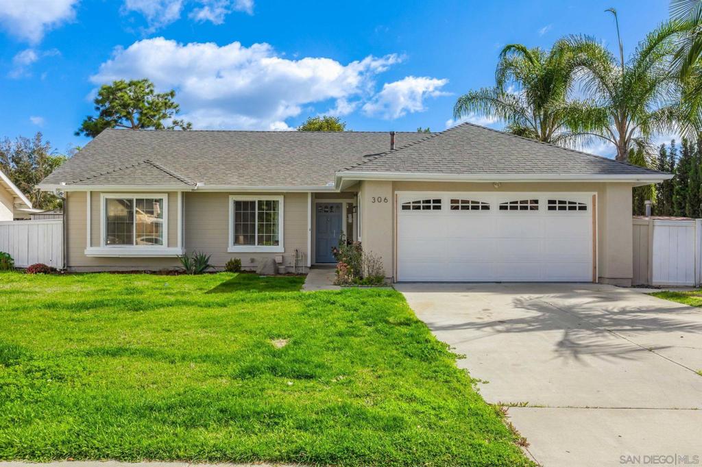 Welcome to a beautifully crafted, single-story home nestled in the heart of Oceanside. Designed for comfort and modern living, this inviting residence features a fresh, updated exterior with energy-efficient upgrades like dual-pane windows and fully owned solar panels—ensuring lower utility bills and year-round efficiency. Inside, you'll be greeted by vaulted ceilings and brand-new flooring that create a bright, spacious feel throughout. Natural light streams in through large windows, while recessed lighting adds a soft, ambient glow. The standout feature is the expansive wrap-around kitchen, complete with stainless steel appliances, generous cabinetry, and plenty of counter space—perfect for cooking, entertaining, and everyday life. A charming bay window overlooking the backyard adds to the open, cheerful atmosphere. Step outside to a backyard designed for relaxation and fun. Enjoy a sparkling pool and spa, a soothing waterfall feature, and a covered patio ideal for both quiet moments and lively gatherings. Mature trees enhance the privacy and natural beauty of this outdoor retreat. An added bonus is the versatile extra room created from a garage conversion—ideal for a home office, guest suite, or creative studio. Situated in a peaceful neighborhood yet conveniently close to schools, parks, shopping, and dining, this home offers the perfect blend of tranquility and accessibility. Whether you're hosting friends or unwinding solo, this thoughtfully designed Oceanside gem is ready to be your perfect match.