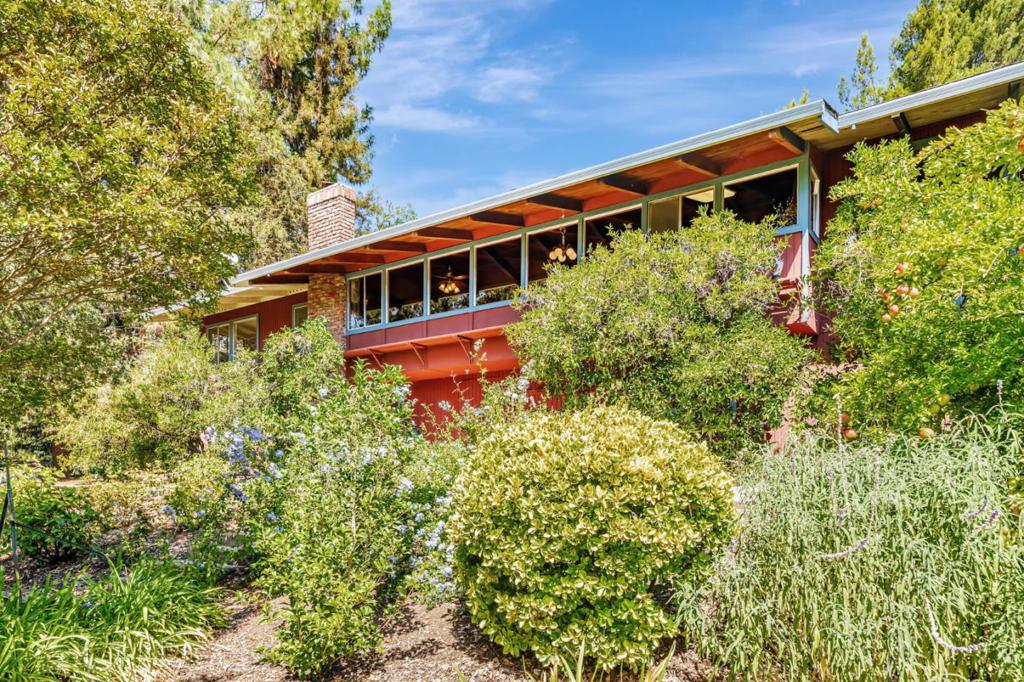 Discover this inviting, country living, private setting home offering 3-bedrooms, 2.5-bathrooms nestled on a spacious 45,302 sq ft private lot in a sought-after Almaden location. With 1,956 sq ft of living space and an exterior-entry basement (including an enclosed room), this property offers comfort, flexibility, and potential. A gated entry leads to a secluded driveway, providing added privacy and security. Enjoy sweeping views of Mt. Umunhum and the surrounding hills from multiple vantage points on the property. The beautifully maintained grounds feature mature landscaping, including seven flourishing citrus trees and a variety of well-tended plants and trees perfect for those who appreciate nature and outdoor living. The back of the home offers a quiet patio to enjoy your time within the garden surroundings. There is detached garage steps away from the home entry that offers comfortable space for 2 cars and extra storage. Located within the highly regarded Almaden Valley, near the Los Alamitos Creek Trail, award winning schools, and a short drive to shopping and Almaden Expressway. This home offers a rare combination of space, scenery, and serenity.