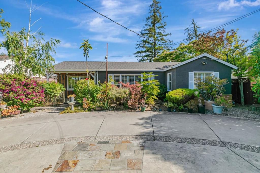 Welcome to 668 Curtner Avenue, a beautifully updated home in the heart of the Bay Area. This property features a huge 12,600 Sq. Ft. Lot with a 1,730 Sq. Ft. main home plus a fully functional 665 Sq. Ft. ADU with private entrance perfect for rental income, guests, or multi-generational living. Recent upgrades include a new roof with a 25-year warranty, new interior paint and fully paid solar panels, providing long-term savings. Located within minutes of Downtown Campbell, Los Gatos Creek Trail, and hikes, this home offers quick access to Highway 17, Silicon Valley, Downtown San Jose, shopping, dining, and parks. The serene, lush backyard creates a private orchard retreat with lemon trees, 4 huge harvesting avocado trees, nectarine, peach, plum, apple, golden apple, orange, loquat, persimmon, and kumquat trees, and a curry leaf tree, which blossom and provide fresh-plucked fruits throughout the year. The expansive backyard offers endless opportunities ideal for hosting parties, BBQs, or adding a pool, outdoor kitchen, or additional living space. With its generous lot size, this property offers incredible potential to expand and customize your dream home while still enjoying a peaceful, private setting.