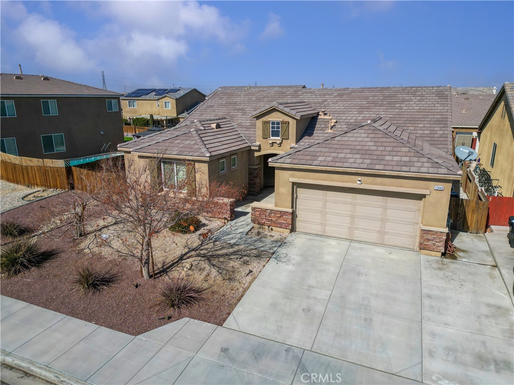 Turnkey, 1 Story home with awesomely flowing floor plan. No HOA. Separate Dining area. This home has a Den that makes it a 4 bedroom home. There's a separate guest bathroom besides 2 full bathrooms. Very clean and well maintained. No repairs needed, just move-in ready. The 3 car garage has a Tandem parking and color coated flooring. The backyard is a Golf Oasis with 4 putting holes. Roofed patio in the backyard with concrete flooring & gravel accents. Come see to be amazed, and it shows like a model home.