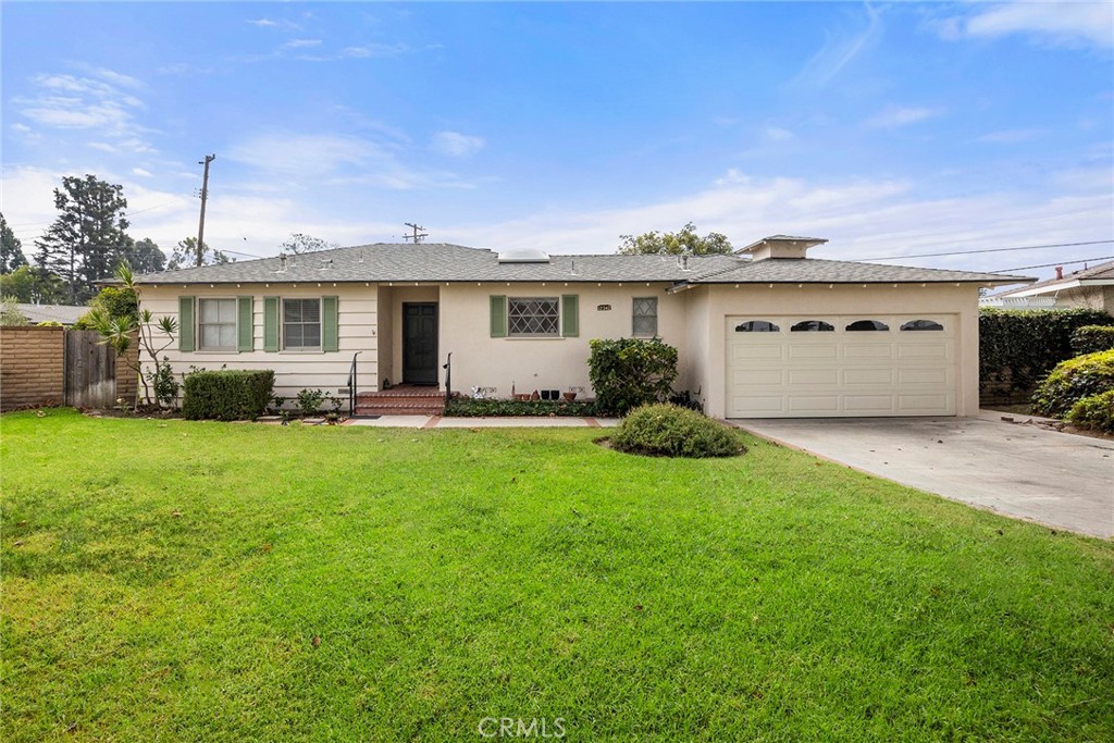 Experience the Best of Orange County Living!
Tucked away on a peaceful cul-de-sac in the heart of Garden Grove, 12342 Rea Cir combines comfort, space, and the quintessential Southern California lifestyle. This well-cared-for home offers 3 generous bedrooms, 2 bathrooms, and 2,024 sq. ft. of living space on an impressive 12,099 sq. ft. lot—nearly one-third of an acre with plenty of room for an ADU or pool.
Step inside to bright, airy interiors filled with natural light. The updated kitchen showcases quartz countertops, stainless steel appliances, a pantry, and flows seamlessly into the living room where a cozy fireplace sets the tone. The expanded primary suite includes a stylish ensuite bathroom with a step-in shower, direct backyard access, and abundant closet space. A secondary bedroom is currently set up as a built-in office, offering flexibility for work or guest use.
One of the home’s highlights is the expansive family room addition, complete with soaring ceilings, a raised formal dining area, and direct access to the spacious backyard. Outside, the possibilities are endless—build an ADU (or two), design a pool, or even add a sport court while still enjoying the lush fruit trees.
Additional features include a 2-car garage with direct entry through the laundry room. The location is ideal—close to parks, schools, shopping, and freeway access—offering both convenience and privacy. Whether you’re hosting gatherings or relaxing outdoors, this property delivers the perfect setting. Don’t miss the chance to make it yours—schedule a private showing today!